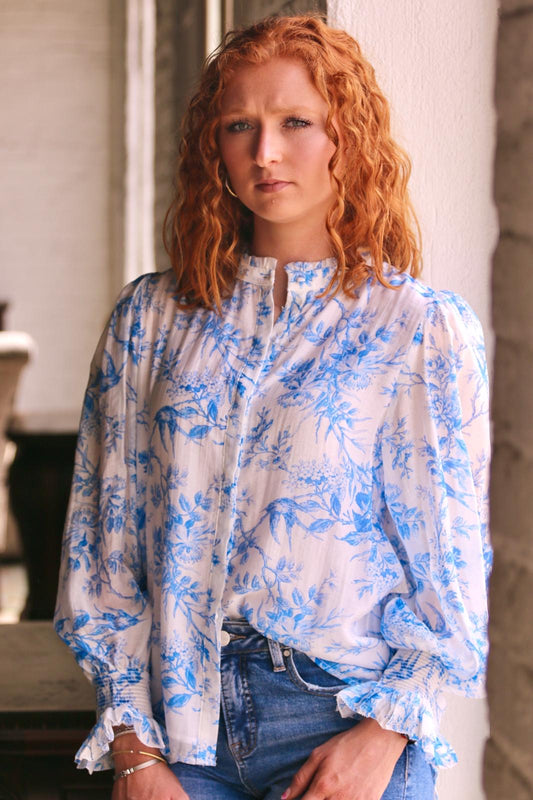 WHITE AND BLUE RUFFLE NECK TOP